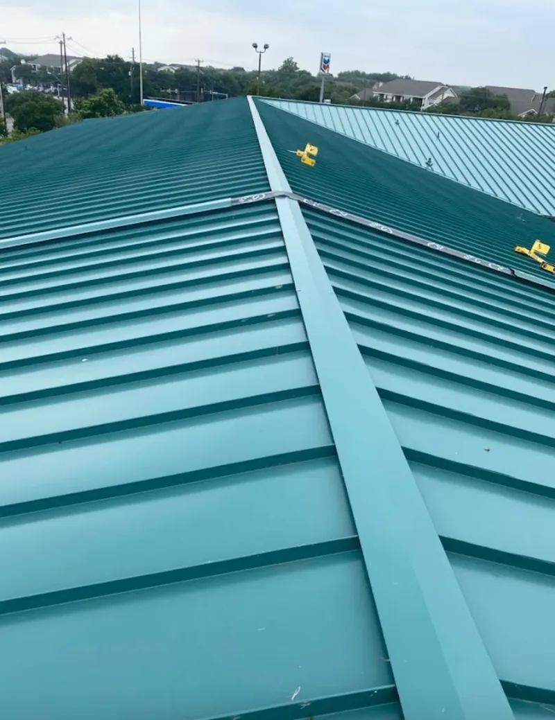 Green commercial metal roof ridge and valley for Metal Roof Repair in Dahlonega